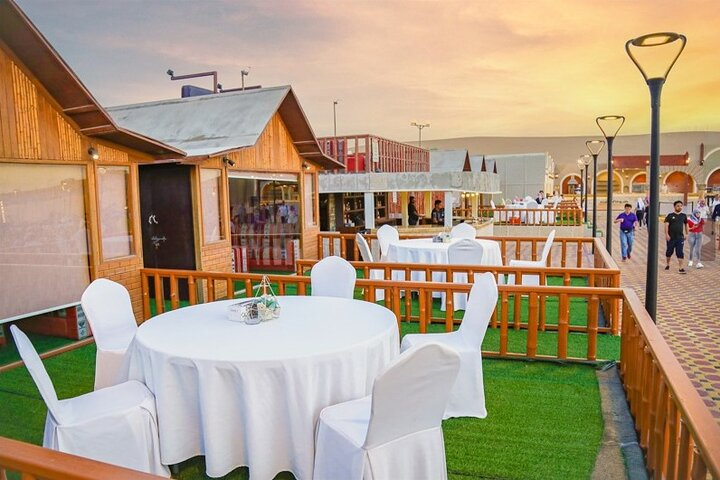 Experience the magic of the desert with a delightful sunset view where traditional hospitality meets adventure in the heart of Dubai's red dunes. Enjoy a unique blend of culture and excitement.